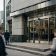 Exterior of a Canadian bank branch on a downtown street, illustrating monetary policy coverage