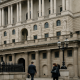 The Bank of England building facade in the City of London under overcast skies