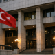 Exterior of a central bank building in Türkiye at dusk, symbolising monetary policy decisions