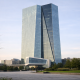 The European Central Bank headquarters tower in Frankfurt against a clear sky