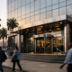 A modern bank facade in a Central African capital representing cross-border banking expansion