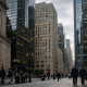 A row of large US bank headquarters facades in a financial district at morning
