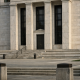 The exterior of a US Federal Reserve building under natural daylight, symbolising a Federal Open Market Committee meeting