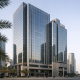 Bank facade in Dubai financial district representing UAE mid-tier banking earnings