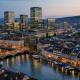 ZKB Post-Stabilisation Notice: No Action on €500m Bail-in Bond 1 The financial district skyline of Zürich, home to Zürcher Kantonalbank, at dusk