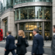 A London bank headquarters facade in the City financial district on an overcast afternoon