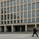 Facade of a large German central bank building under soft daylight, symbolising monetary policy reporting