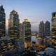 Bangkok financial district skyline at dusk with international banking towers