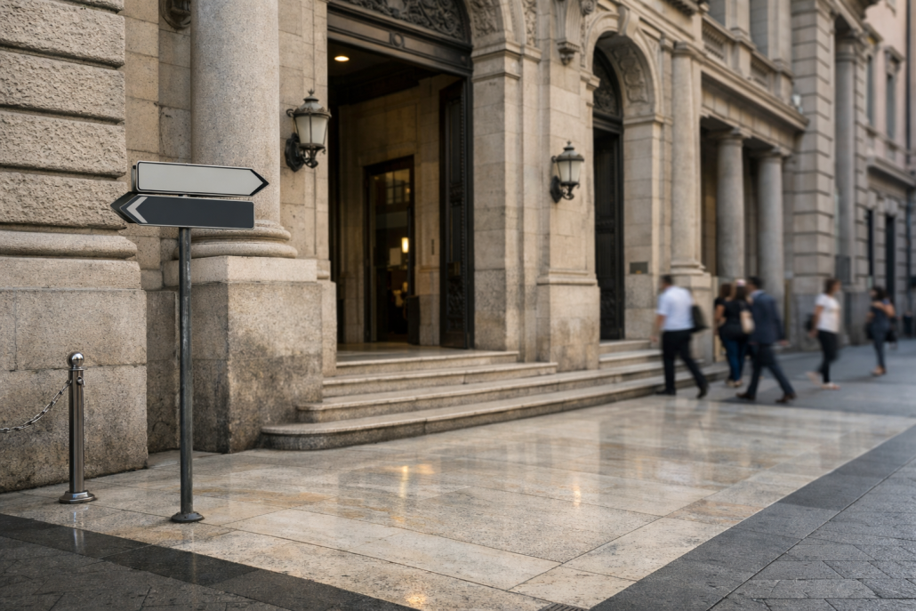 A bank facade in an Italian financial district with a directional street sign, symbolising a major Italian banking merger vote – Intesa Sanpaolo MPS tender offer