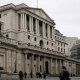 Bank of England facade in London with a view of the City financial district