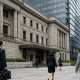 A bank facade in a Tokyo financial district photographed at eye level under soft natural light