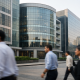 Facades of major Indian private bank branches in a financial district