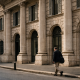 A row of Italian bank branch facades on a Rome street, representing the 2027 budget levy on the financial sector