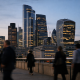 Night view of a London financial district skyline representing UK sanctions enforcement
